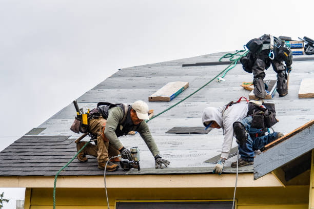 Professional Gutter Installation technician working in Woods Cross Roads, VA